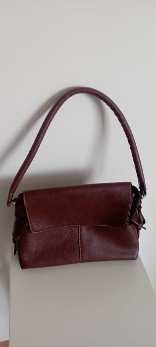 Women's leather handbag with crossbody strap