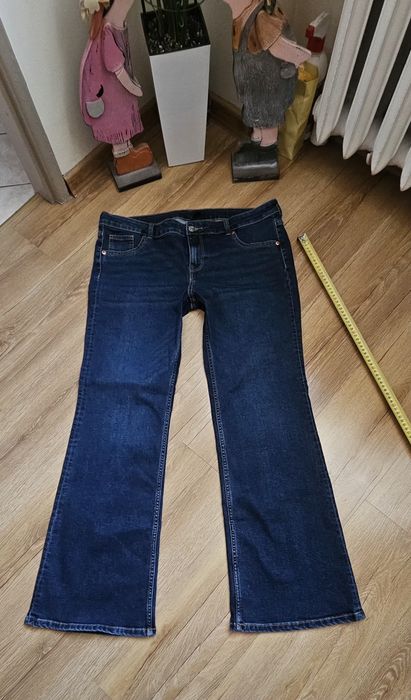 Granatowe dżinsy dzwony H&M rozmiar  48