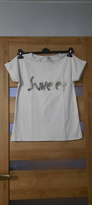 Bluzka z wypukłym napisem