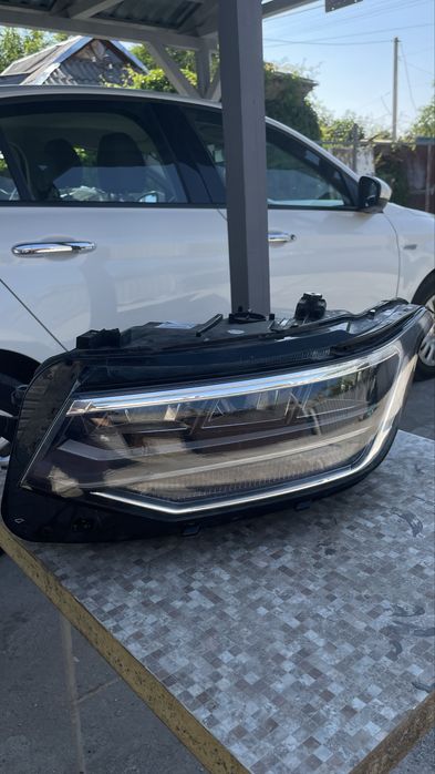 Фара левая vw tiguan USA