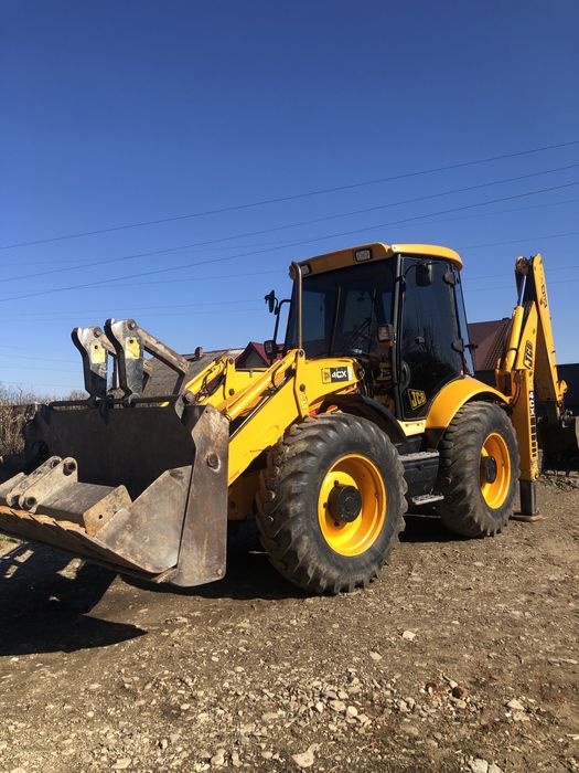 Послуги екскаватора-навантажувача