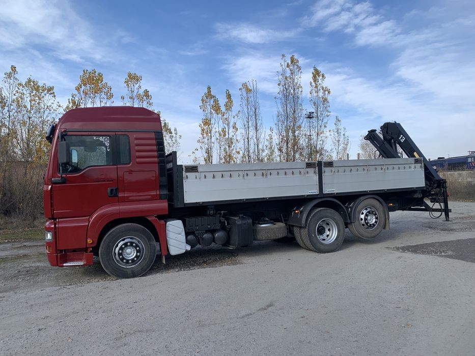 Ман самоскид з маніпулятором