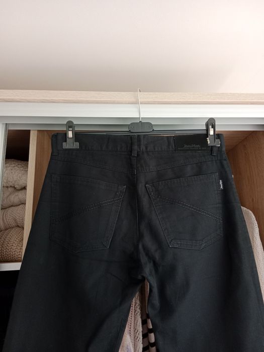 Eleganckie czarne spodnie męskie garniturowe Janimen M