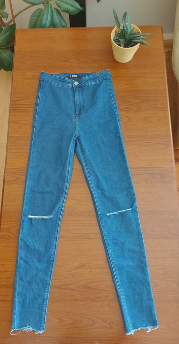 Jeansy z rozdarciami Sinsay Denim collection rozm. 36
