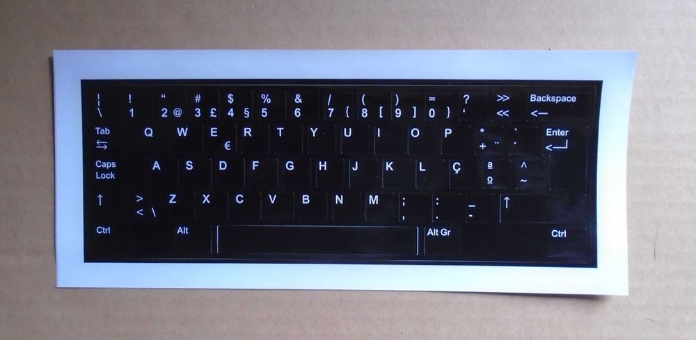 Self-adhesive keys convert foreign keyboards into NEW Portuguese64585104113537123