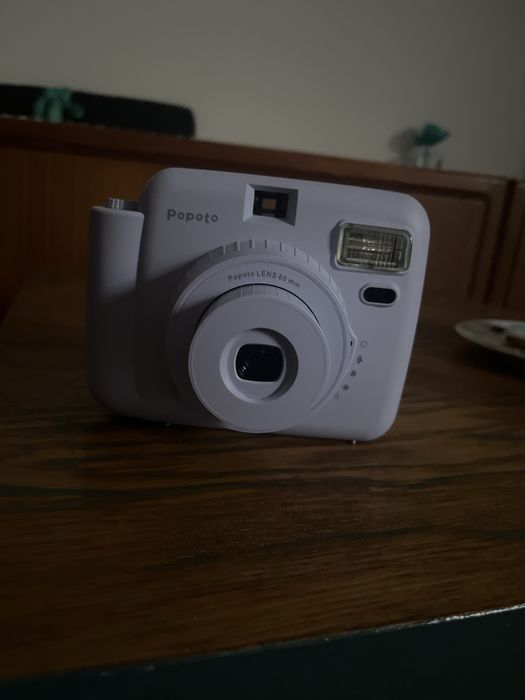 Maquina de fotografias instantanias