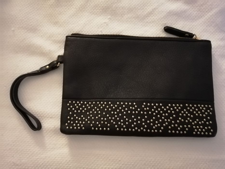 Clutch preta muito versatil