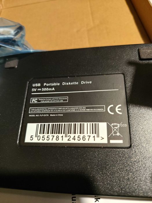 Czytnik dyskietek plus 11 szt. dyskietek