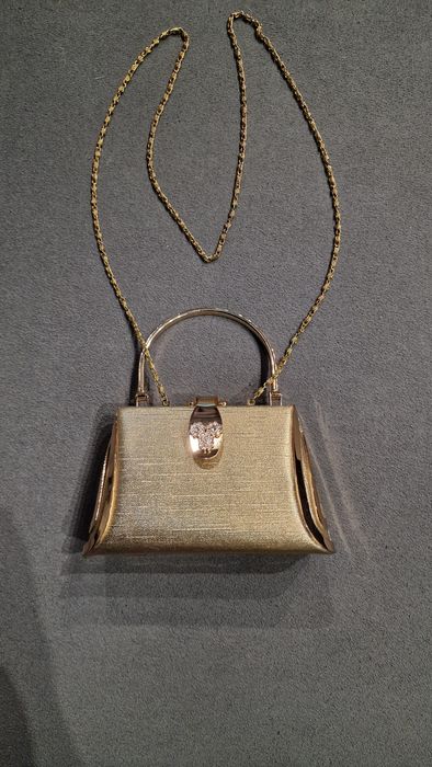 Жіночий золотистий клатч