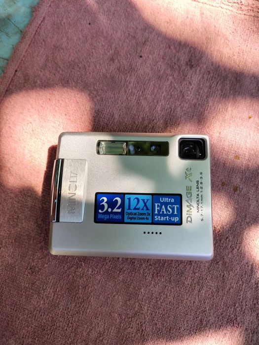 Фотоаппарат Minolta DiMAGE Xt