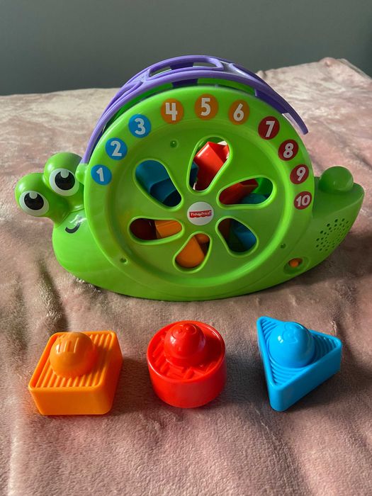Śpiewający ślimak Sorter kształtów Fisher Price
