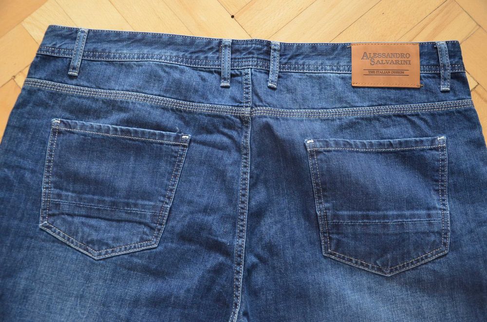 Spodnie dżinsy jeansy Alessandro Salvarini W42 L30 nowe z met. granat