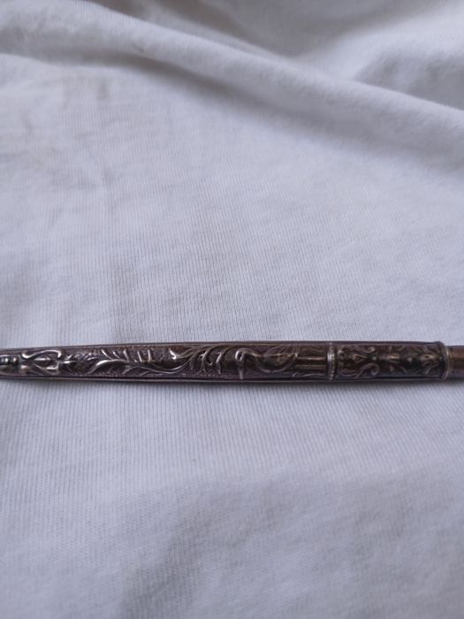 Pena em prata antiga