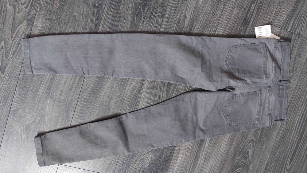 Nowe spodnie jeansowe Sinsay 36