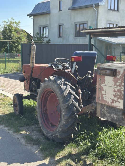 Трактор універсал 445 , причеп , косарка роторна z-069