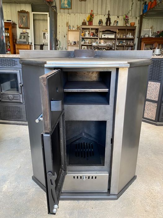 Vendo salamandra toda em inox de canto com forno e fogão pra cozinhar como nova
