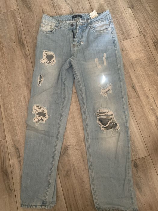 Джинси рвані мом