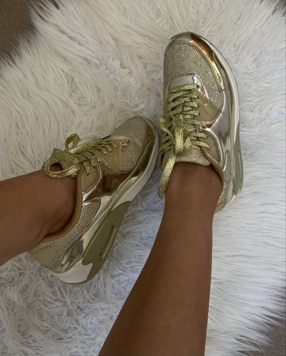 Жіночі  кросівки