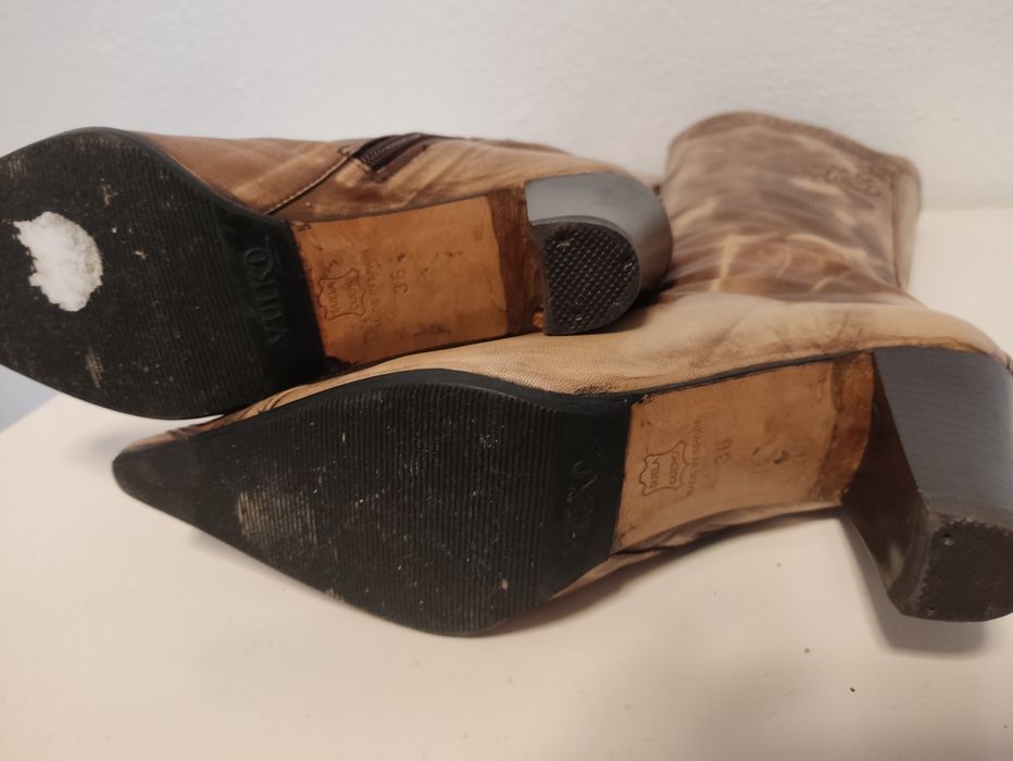 Botas em pele de mulher