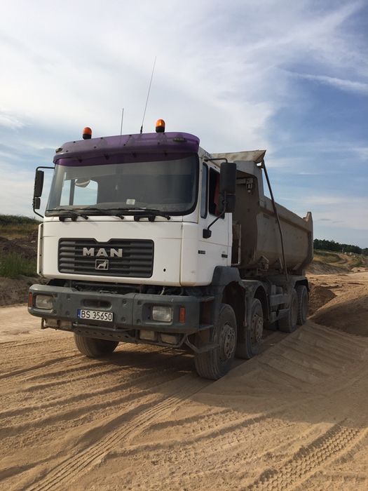 Transport + ładunek żwiru, piasku, ziemi, czarnoziemu, gruzu, kamienia