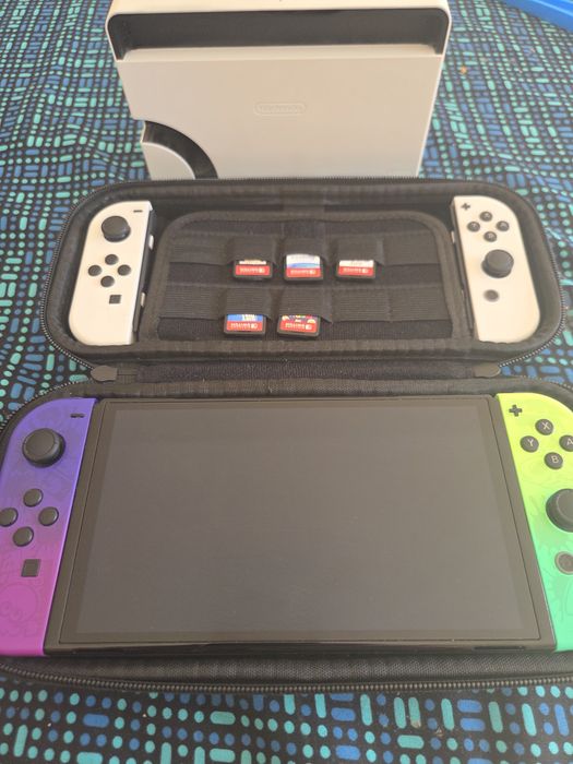 Nintendo Switch OLED Branca (quase nova) + 4 Joy-Cons + 6 jogos com caixas + sacoche + dock –