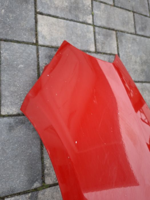 Skoda fabia 2 roomster blotnik przedni lewy czerwony lf3k