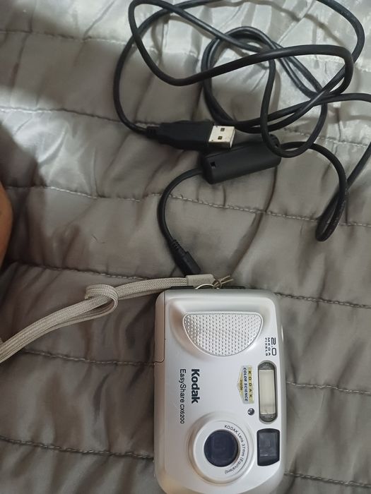 Maquina fotos kodak  e flilmar como novas