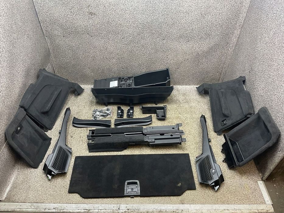 Wnetrze tapicerka boczki podloga bagaznika czarna BMW X5 E70 7 osob