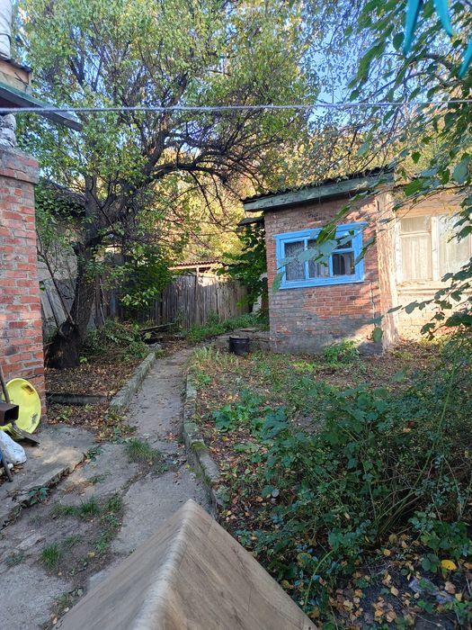 Продаж частини будинку поруч з центром