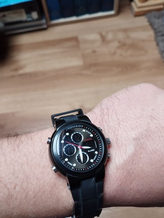 Годинник Peugeot