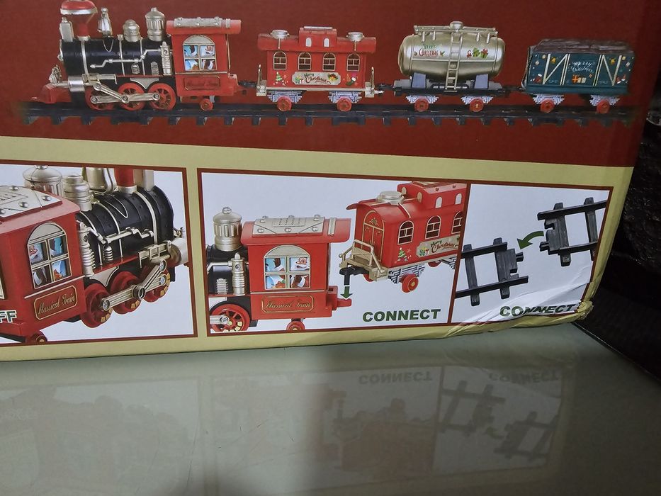 Este conjunto de brinquedos é o Train the World, um comboio de Natal t