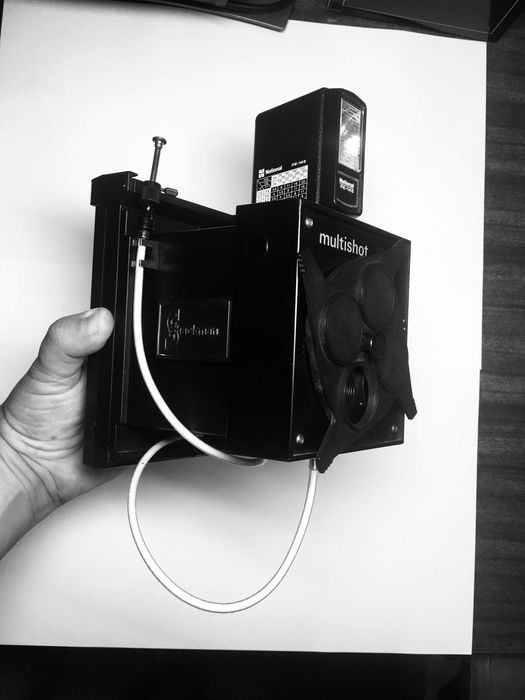 Polaroid schackman multishot 104 com disco, flash e cabo disparador64284472118146124