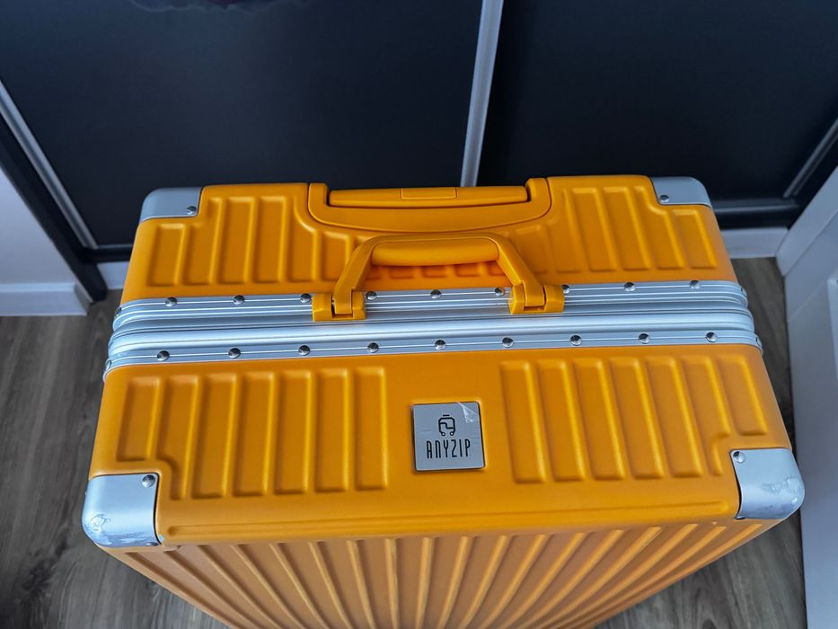 ANYZIP Lekka twarda walizka PC+ABS XL 28” 49x29x74 H cm 90 L TSA x2 alu