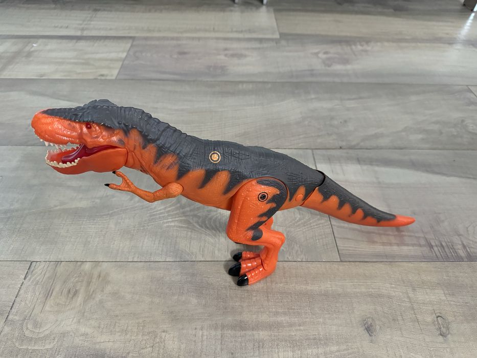 Tiranossauro Laranja Andador 45 cm