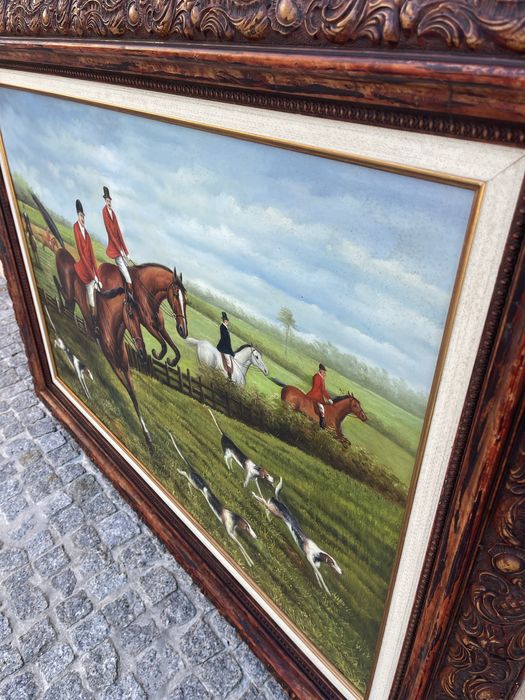 Quadro com pintura de caça com 1,15 de largura e 85 de altura.