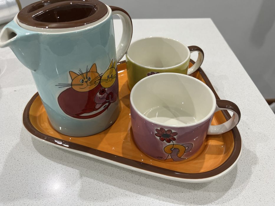 Bule de cha loja gato preto