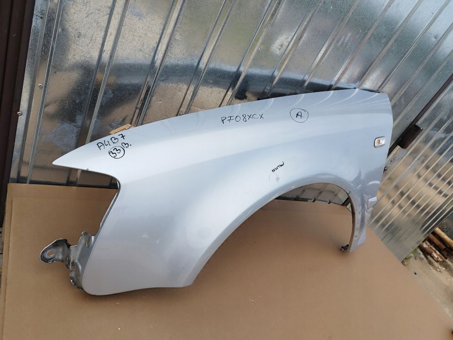 blotnik lewy przod audi a4 b7 cabrio 2004-2008 kolor ly7w