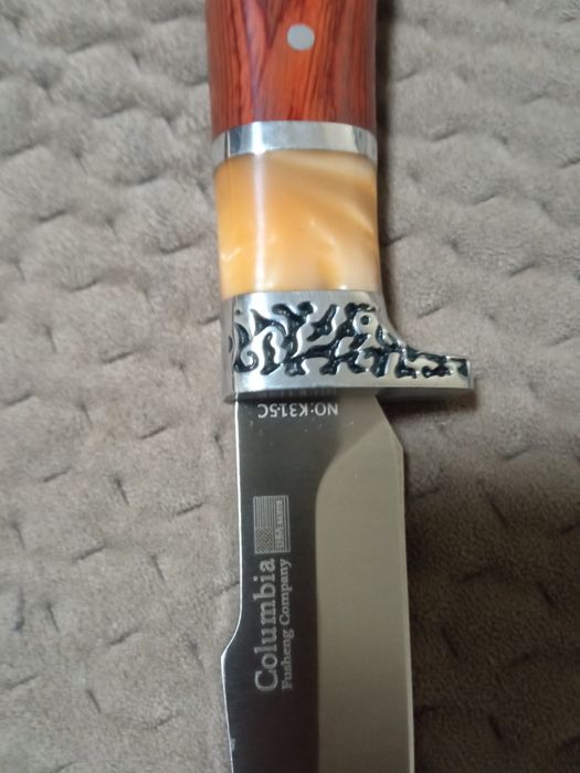 Багатоцільовий  ніж із чохлом