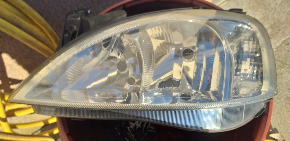 Farol esquerdo Opel  Corsa 1.3 CDTI