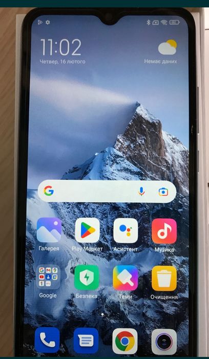 Телефон редмі 9.