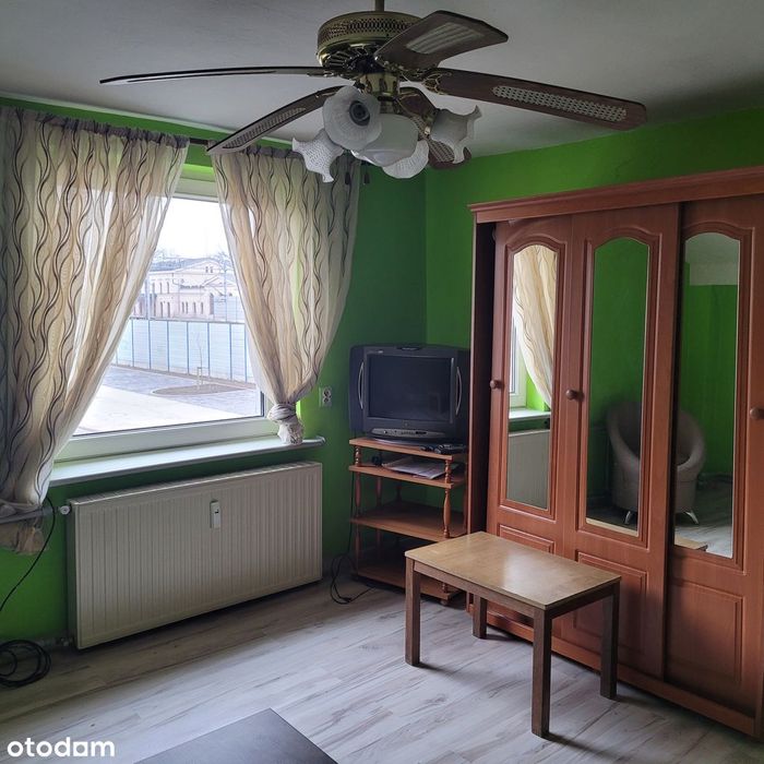 Mieszkanie w budynku dwulokalowym z działką garaż, budynek gospodarczy