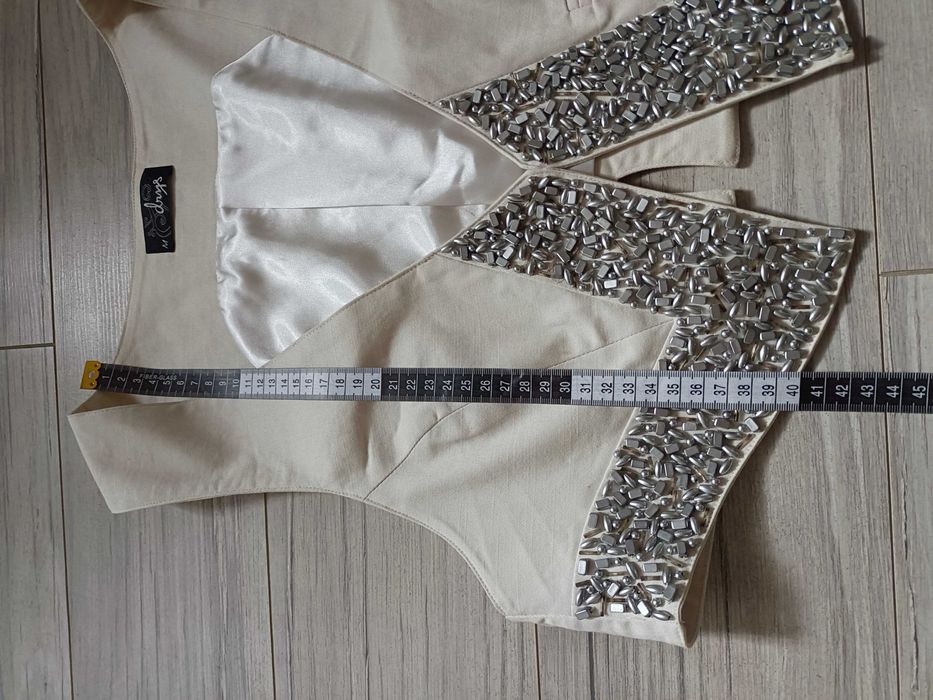 Kremowa kamizelka damska 36/38