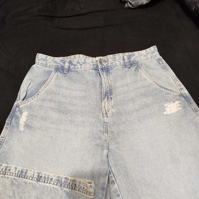 Джинси жіночі широкі