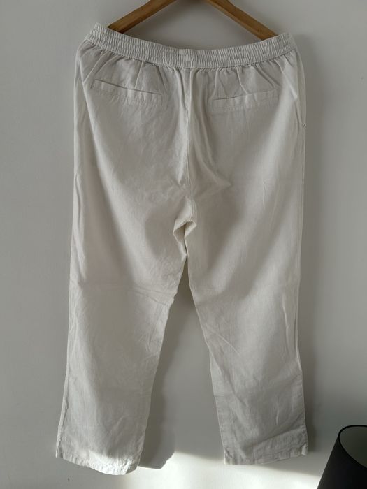 Białe spodnie lnianie Tchibo