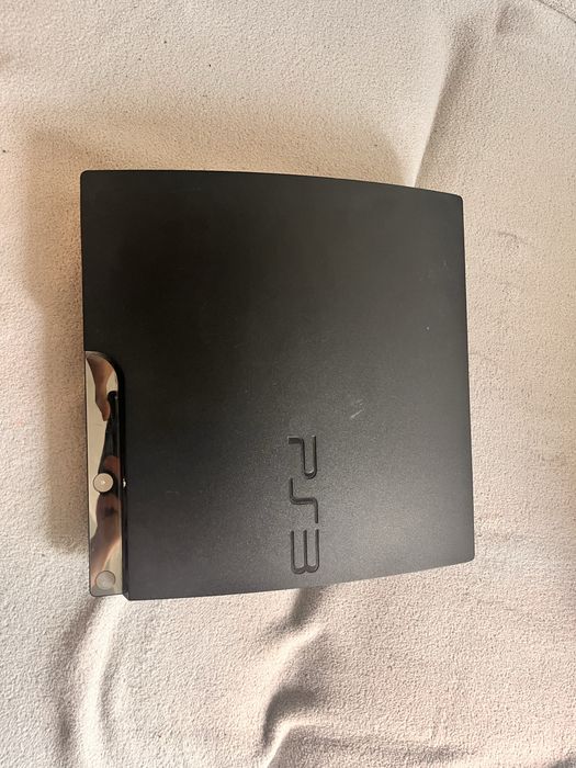 PlayStation 3 Slim 120 GB + 8 gier + pad
