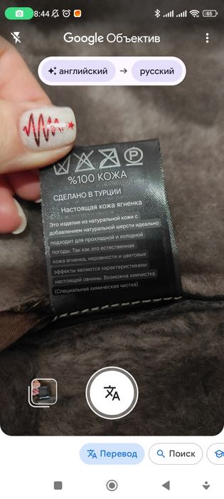 Дублянка натуральна жіноча коротка з капюшоном на ґудзиках
