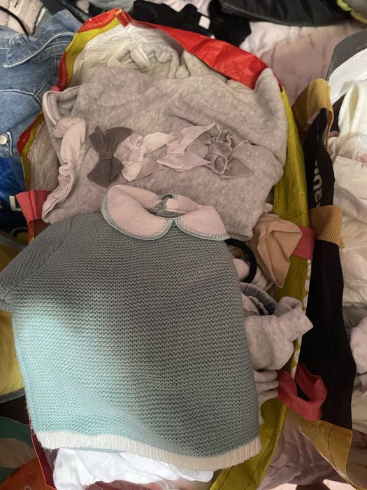 Saco com roupa para bebe