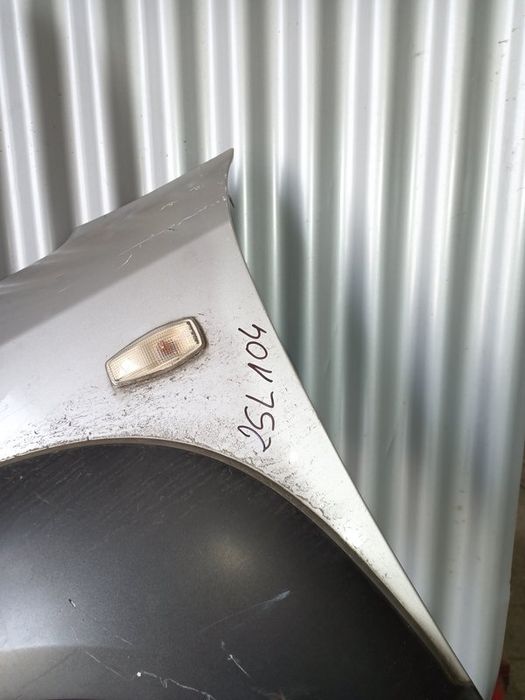 Guarda Lamas Hyundai Tucson MK1 ESQUERDO  Cinza