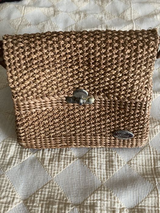 Mala tiracolo em verga