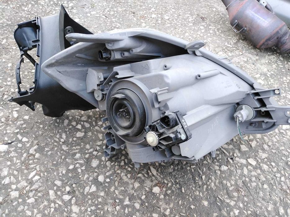 Farol Esquerdo Daihatsu Sirion 2006